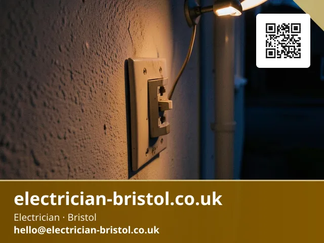 Discoloured light switch plate being unscrewed from a wall