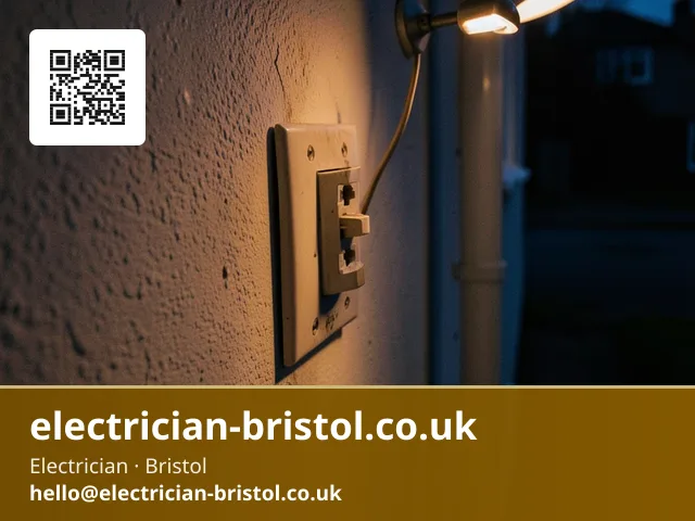 Discoloured light switch plate being unscrewed from a wall