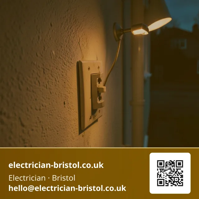 Discoloured light switch plate being unscrewed from a wall