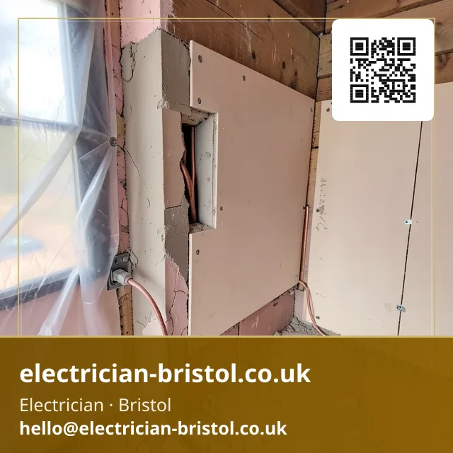 Back box being fitted into a freshly cut plasterboard opening