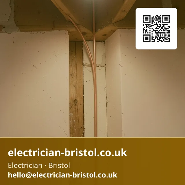 Cable being threaded through a stud wall cavity with a draw wire and a fish rod guiding it between two openings