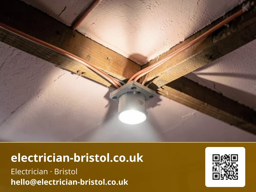 Cables being looped in at a ceiling rose before a pendant fitting is attached